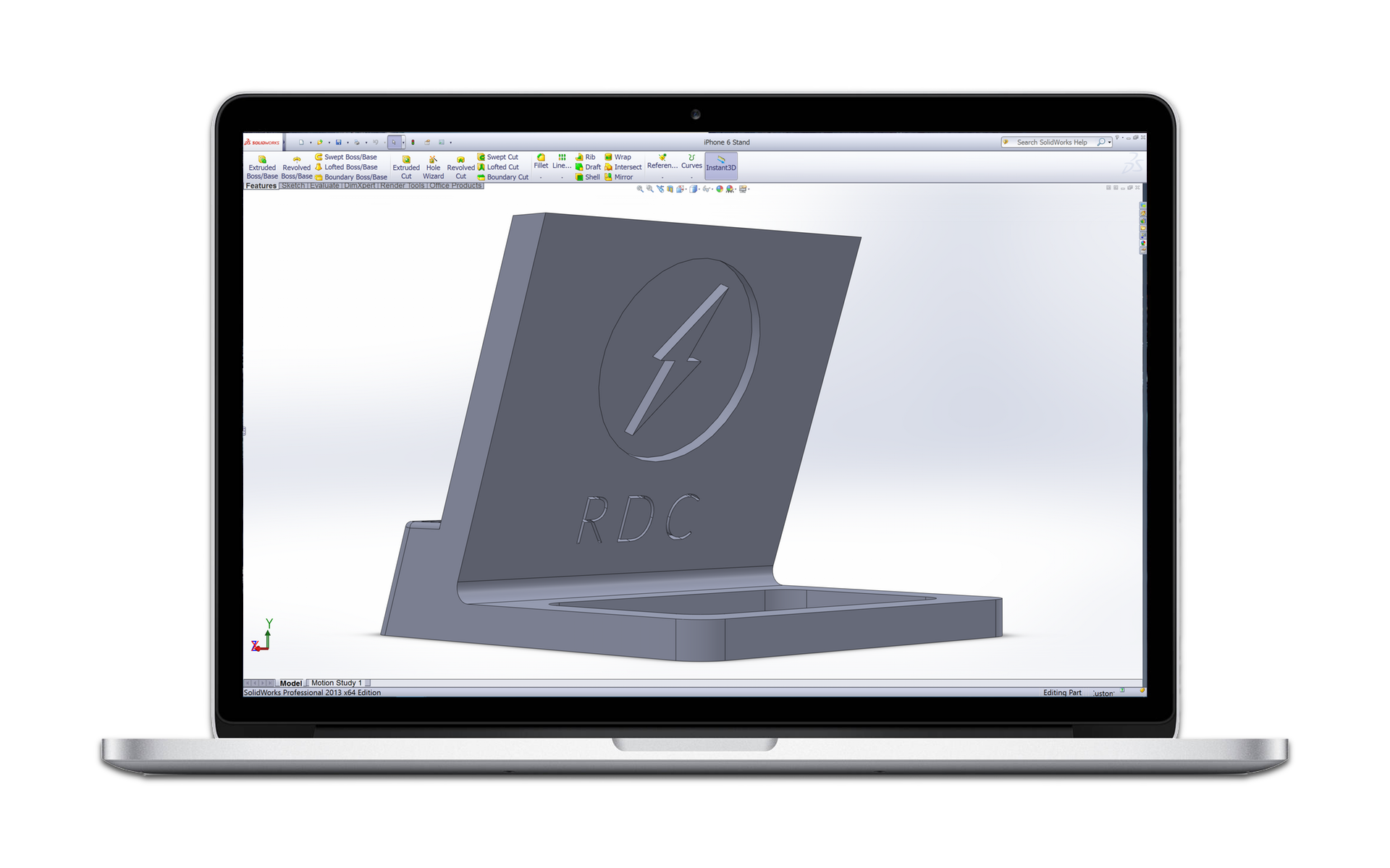 3D design software showing on a laptop displaying a rendering of a phone stand